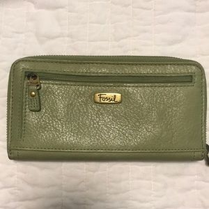 Brand new green leather fossil wallet.